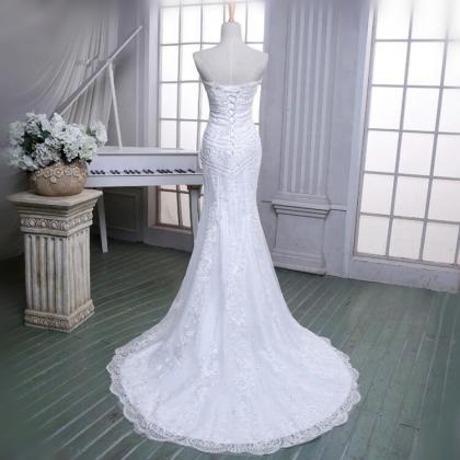 Strapless Lace Mermaid Wedding Dress Featuring..