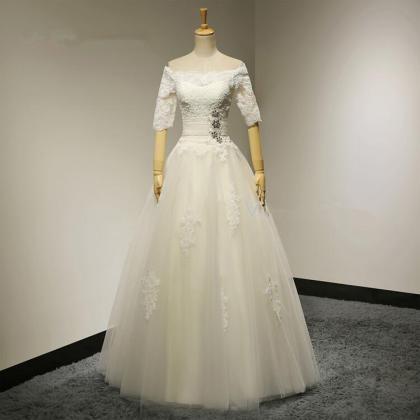 Bridal Ball Gown Boat Neck Beadings Half Sleeves..