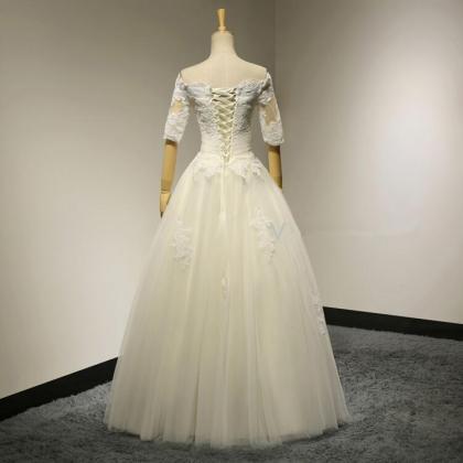 Bridal Ball Gown Boat Neck Beadings Half Sleeves..