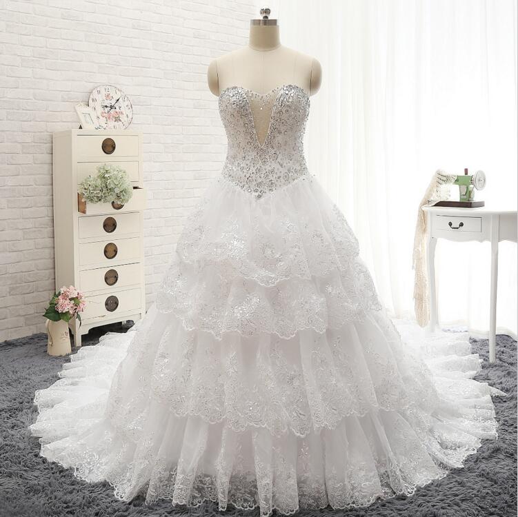 2016 Luxury Beads Sequins Wedding Dress Sweetheart Tiered Ruffles White Royal Train Bridal Gown Plus Size
