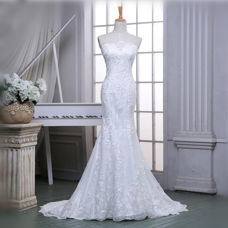 Strapless Lace Mermaid Wedding Dress Featuring Lace Up Back And Train