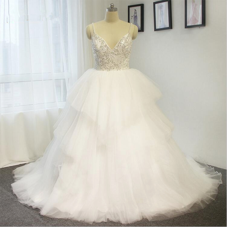 V-neck Spaghetti Strap Beaded Tiered Ruffled Ball Gown Wedding Dress With Long Train And Crisscross Back